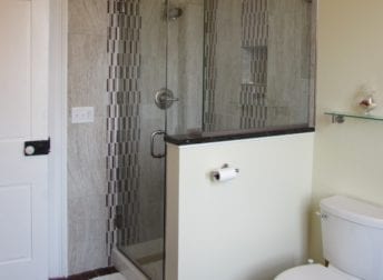 A Downtown Frederick bathroom remodel in a historic home that features a vessel bowl sink and clawfoot tub that fit the style of the house