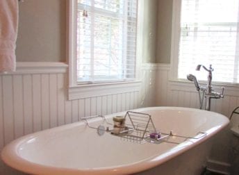 Master bathroom renovation project that features a stand alone clawfoot tub and corner shower that is full of ideas to use on your project