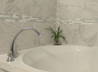 Condo bathroom remodels in downtown Frederick with custom shower enclosures and stand alone tub, think what they may look like in your house