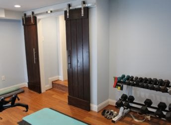 Who does home remodeling for a home gym like this one Talon Construction built in Frederick