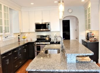 Who does home remodeling using design-build process. Talon built this kitchen remodel includes a laundry room in the basement